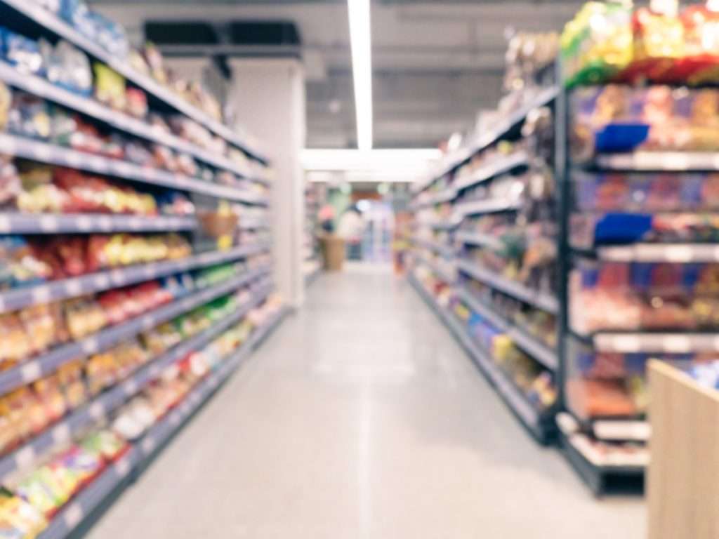 blurred supermarket aisle