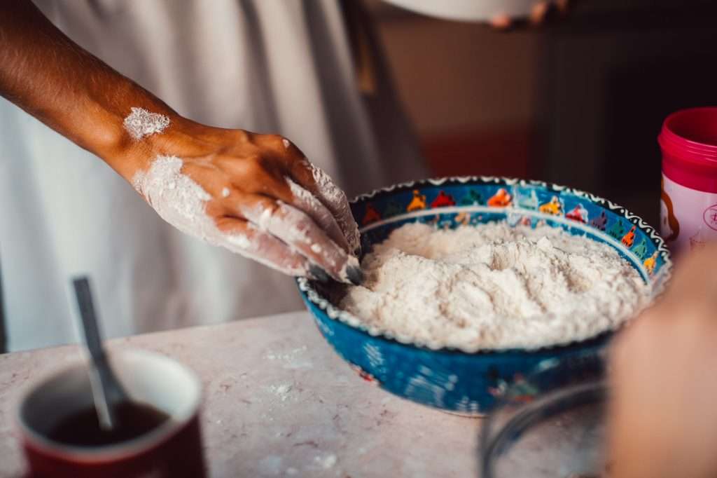 Hands in flour