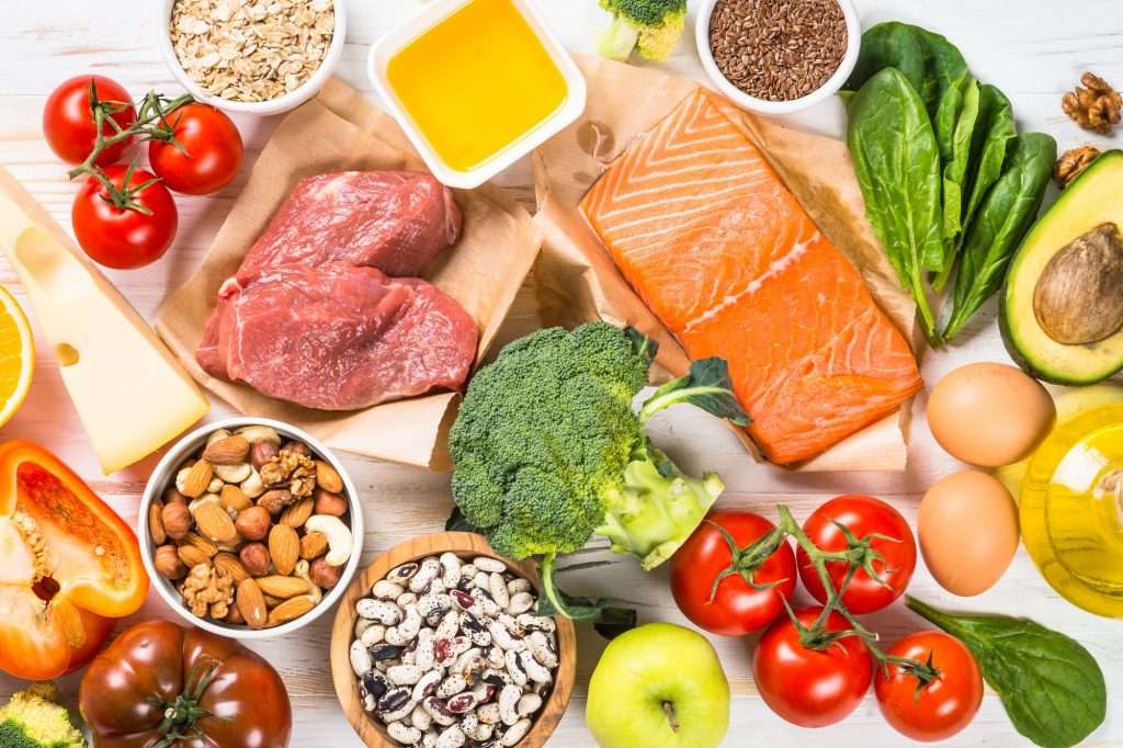 Healthy food products at white background top view