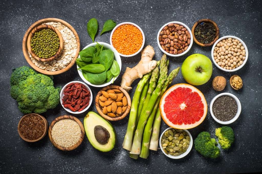 Superfoods on black stone background